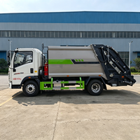 Camion compacteur de déchets puissant Sinotruk HOWO 8CBM avec structure de chargement arrière pour la collecte et l'expédition de déchets industriels