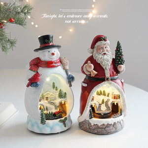 Nouvelle boîte à musique lumineuse en résine pour Noël, ornement Père Noël, bonhomme de neige, petite <span class=keywords><strong>maison</strong></span> en résine, décoration boule de Noël - Product Image 1