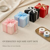 Boîte cadeau carrée surdimensionnée en gros à faible MOQ en stock avec logo personnalisé, ruban, nœud, poignée en cordon, boîte vide, prix d'usine, OEM ODM