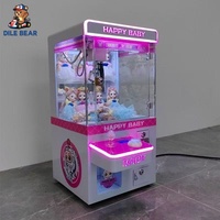 Machine à grue commerciale intelligente à monnayeur, style Happy Baby Tide House, pour la distribution de cadeaux et de peluches dans les zones de jeux d'arcade