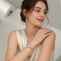 Montre élégante pour femme de style français, chaîne en métal à maillons perlés, cadran en nacre, montre-bracelet à quartz de luxe résistante à l'eau