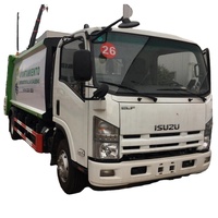 Camion compacteur de déchets Isuzu ELF 4x2, camion à chargement arrière, véhicule de compression des déchets