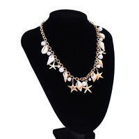Ensemble de bijoux bohème pour l'été et la plage : Chaîne de taille en alliage avec coquillages, perles d'imitation, étoiles de mer et conques, et bracelet-collier de ventre