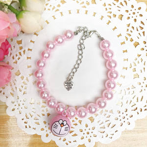 Lindo gato y <span class=keywords><strong>collar</strong></span> de perro pequeño <span class=keywords><strong>Collar</strong></span> con perla de dibujos animados campana de cobre decoración ajustable Cadena de cuentas proveedores de mascotas - Product Image 1