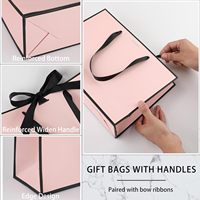 Des arcs roses décorent le sac en papier d'emballage écologique de demoiselle d'honneur de luxe au détail Portable Boutique pour le magasin de vêtements