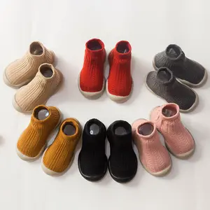 El mercado de la Unión al por mayor venta caliente bebé caminar niños Unisex zapatos de bebé niño niñas de prewalker zapatos de bebé