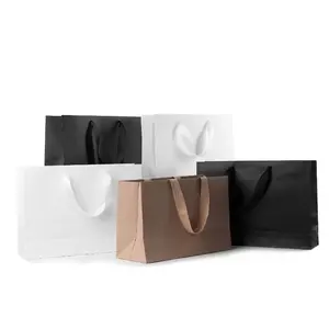 กระเป๋ากระดาษมือถือเสื้อผ้าช้อปปิ้งของขวัญเปล่าคราฟท์หนังทำเองถุงกระดาษคราฟท์สีขาว