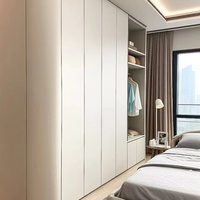 Armoire en bois sur mesure avec portes battantes, coiffeuse, rangement modulaire et tiroirs à fermeture amortie
