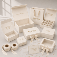 Caja de Regalo Plegable Rígida de Color Marfil para Bebés, con Lazo de Cinta, para Sets de Regalo de Boutique, Embalaje OEM Personalizado para Comercio Electrónico