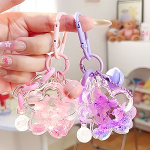 Lindo Llavero de Sakura con Efecto de Arena Movediza, Campana y Cadena, Colgante de Flor Kawaii en Negro y Azul para Accesorios de Bolsos de Niñas - Product Image 2