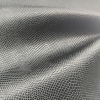 Nouveau produit : Tissu en cuir PU à grain fin pour vêtements et pantalons en cuir