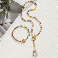 Ensemble collier et bracelet pour femme avec perles de pierre naturelle facettées étanches, fermoir OT vibrant, pendentif pompon en perle naturelle