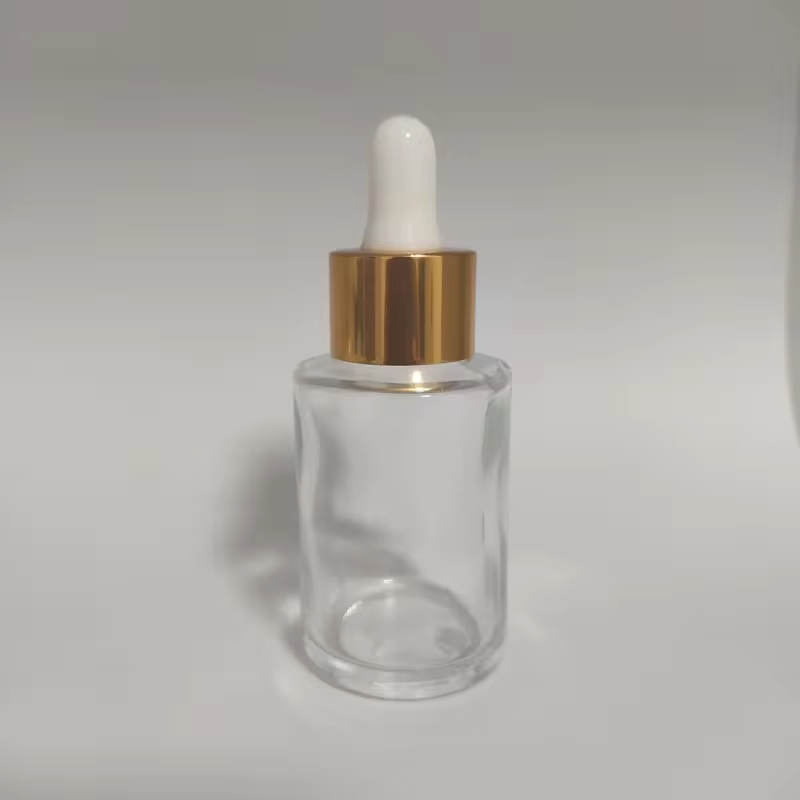 bouteille transparente + anneau en aluminium doré brillant + tête en caoutchouc blanc