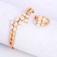 Ensemble bague et bracelet de luxe en forme de goutte d'eau, demi-grand diamant, demi-petit diamant, ouverture en forme de balle, accessoire de mode pour femme