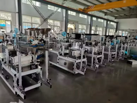 Machine de fabrication automatique à grande vitesse de serviettes hygiéniques pour femmes Machine de fabrication de tampons avec colle