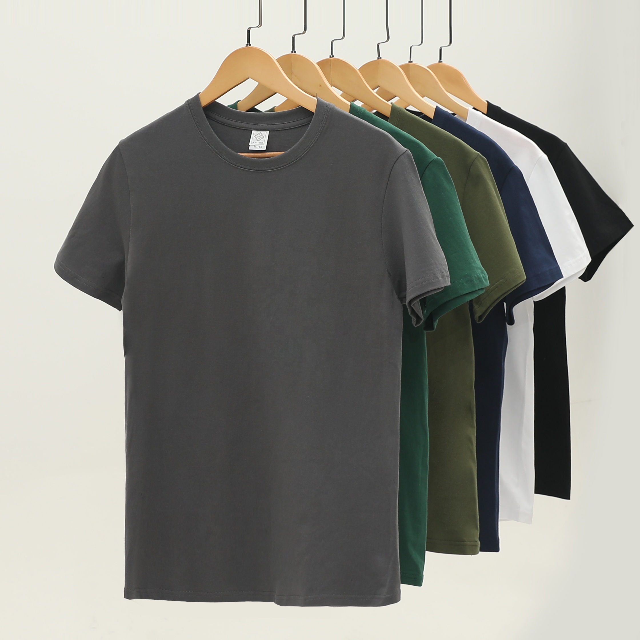 Vente en gros, t-shirt vierge à manches courtes en coton avec Logo imprimé pour homme, toucher sain et de bonne qualité