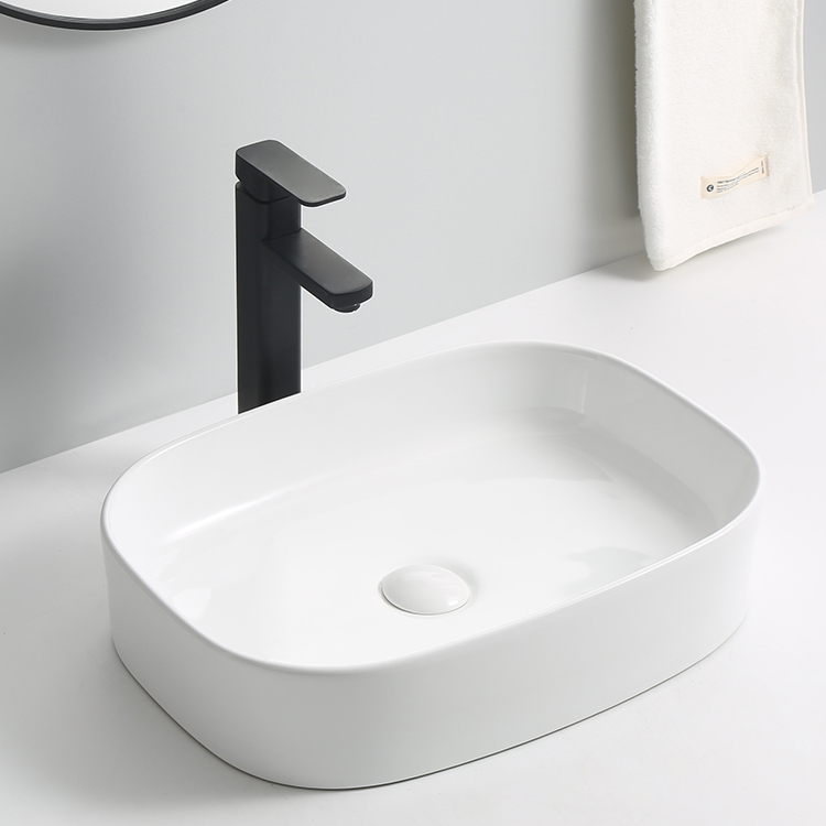 Silicone adhesion vs. mounting ring attachment methods for vessel sink installation Silicone adhesion vs. mounting ring attachment methods for vessel sink installation