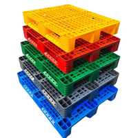 Vente en gros de palettes en plastique HDPE 3 canaux, simple face de qualité alimentaire avec métal renforcé pour rayonnage