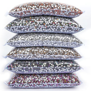 Venta al por Mayor a Bajo Precio de 14400 Piezas de Cristales de Vidrio Planos Multicolores CrystaSS3-SS20 para Decoración de Camisetas y Uñas - Product Image 1