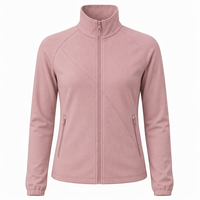 Veste athlétique personnalisée à col montant et fermeture éclair intégrale pour femme, texture micro-gradée, manches raglan, poches zippées, coupe ajustée légère