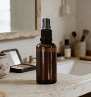 Flacon en verre ambré rond de 50 ml avec couvercle opaque, récipient scellé pour l'emballage d'huiles essentielles, de sérums et de produits de soin de la peau