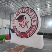 Panneau publicitaire gonflable personnalisé avec logo de marque, ventilateur intégré et souffleur d'air pour utilisation en extérieur