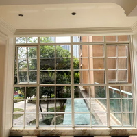 Fenêtre à battant en alliage d'aluminium de style français de luxe avec grilles décoratives, verre double vitrage insonorisé pour villa