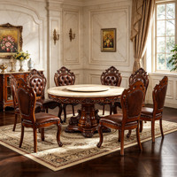 Ensemble de table à manger en marbre européen avec plateau tournant, chaises en bois massif sculptées à la main et revêtement en cuir PU, mobilier de salle à manger en gros