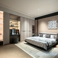 Armoire moderne bicolore avec garniture métallique et coiffeuse intégrée, dressing de chambre personnalisé avec éclairage LED