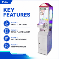 Máquina recreativa de grúa de garras pequeña de metal y plástico Ruike con interfaz en inglés, Mega Mini, operada con monedas, para premios de peluche