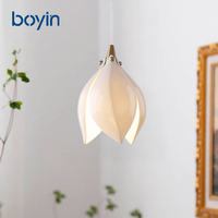 Lustre long de luxe en forme de fleur de magnolia, suspension nordique en porcelaine multi-têtes rotative pour escalier à plafond haut