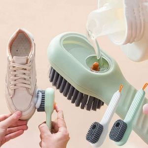 Cepillo para Zapatos Multifuncional Ecológico de Plástico con Mango Largo, Cerdas de Nylon Suaves, Aplicación Automática de Jabón Líquido, Gancho para Uso Doméstico - Product Image 1
