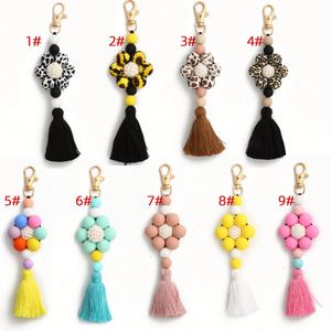 Porte-clés à pompon en silicone tressé avec perles florales pour femme, motif chien et panda, breloque de sac, vente chaude - Product Image 2