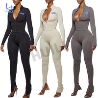 Huili personnalisé de haute qualité deux pièces fermeture éclair haut court et Leggings pantalon de jogging survêtement maigre Gym 2 ensembles tenues pour les femmes