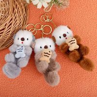 Porte-clés en peluche de 15cm avec motif de dessin animé Animal en peluche mignon et doux Porte-clés en forme de loutre de mer
