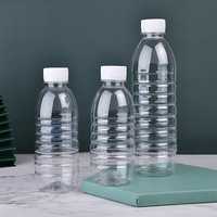 Bouteille de boisson transparente sans BPA de 250 à 1600 ml, bouteille en plastique PET vide personnalisée pour l'eau minérale