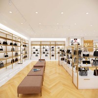 LUX Design Factory Présentoir personnalisé de sacs en métal doré Armoire vitrine de sacs de vente au détail avec garantie de 5 ans Capacité de 500 magasins