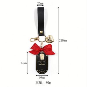 Elegante Llavero de Cuero PU con Lazo y Etiqueta con Letras Doradas, Colgante de Corazón con Estilo para Mujeres y Niñas, Bonito Adorno para Bolsos - Product Image 5