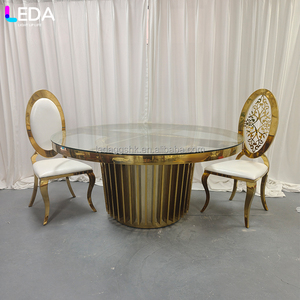 LEDA Fournitures de luxe pour événements et réceptions, table ronde en verre transparent et métal doré pour hôtels et mariages - Product Image 1