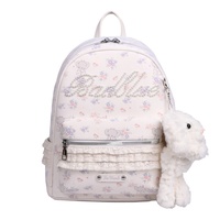 Sac à dos pour filles à l'aspect élégant et tendance, imprimé en dentelle, avec pendentif en peluche détachable, pour l'école et l'usage quotidien