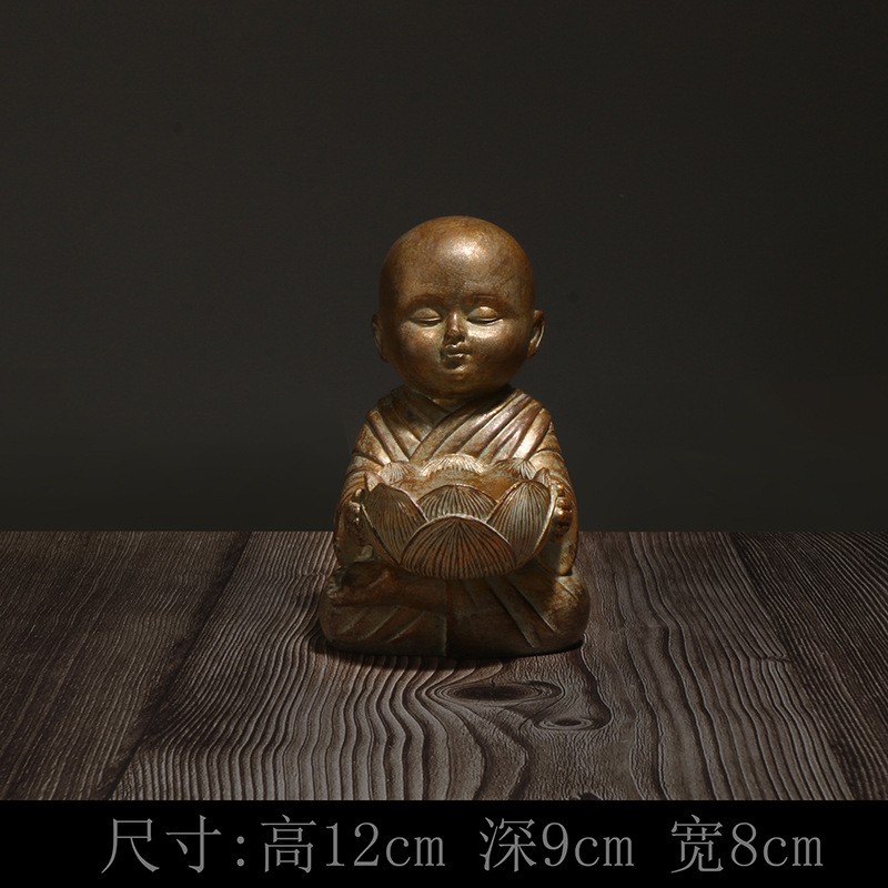 Little monk holding lotus candlestick-bronze