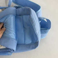 Sac à dos scolaire durable bicolore avec panneau dorsal rembourré et compartiment principal à double fermeture éclair pour enfants, idéal pour les voyages décontractés et les activités de plein air