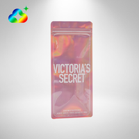 Pochette Zipoer rose transparente anti-odeur avec logo personnalisé transparent sur un côté sacs d'emballage alimentaire en plastique mylar holographique avec zip-lock