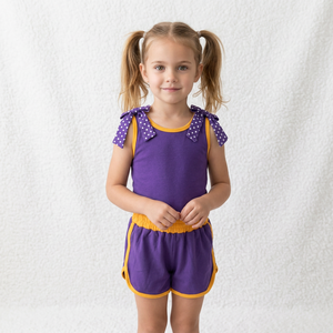 ชุดเสื้อผ้าเด็กผู้หญิงแขนกุดลายจุดสีม่วงพร้อมโบว์ - Product Image 1