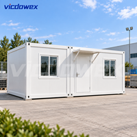 VICDOWEX Maison Conteneur Modulaire Préfabriquée Portable à Montage Rapide Design Contemporain pour Bureau de Chantier Éloigné et Dortoir