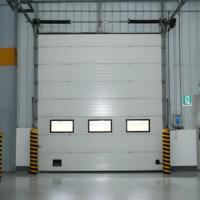 Puertas Seccionales Industriales Automáticas de Acero Modernas Personalizables para Logística y Transporte