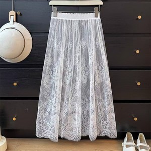 A black cheongsam with a <b>lace</b> slip dress underneath; a long mesh oversized versatile cheongsam paired with a black base skirt. - Product Image 1