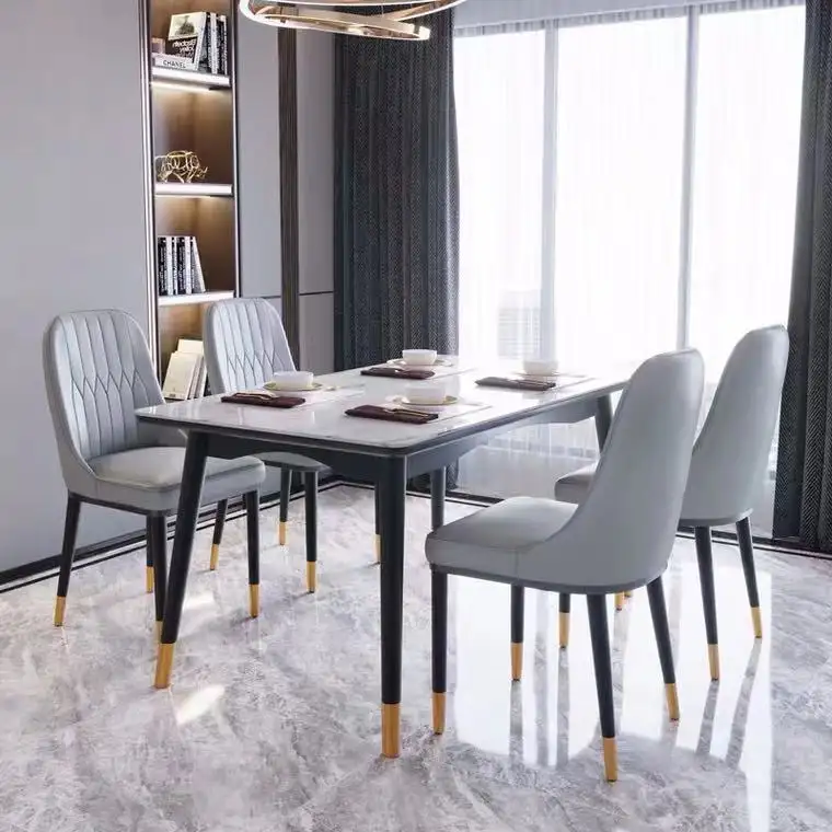 Muebles modernos de lujo para el hogar, mesa de comedor superior de mármol y piedra sinterizada de metal con sillas, China