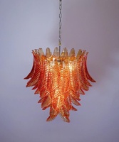 Énorme lustre en spirale en verre d'art orange brûlé rond en ambre de Murano italien pour salon salle à manger