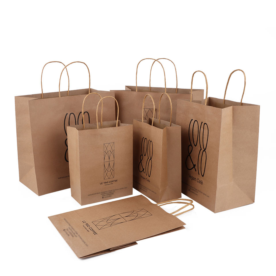 Factory sale custom print logo kraft clothing carry packaging paper bag with handle